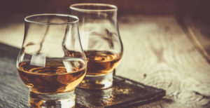 Two glasses of bourbon whisky.